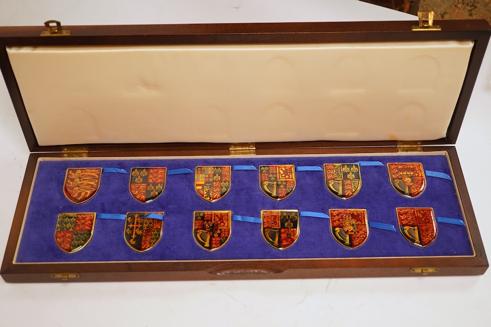 Yorkshire Mint 'Royal Arms Collection' of 12 enamelled silver armorial shields, cased and Westminster Mint 12 QEII Falkland Islands Golden Jubilee proof silver coins, cased (2 cases)